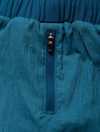 RONHILL Spodenki do biegania męskie TECH RACE TWIN SHORT legion/fluo orange